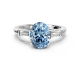 White gold Fancy Blue Oval  Cut Diamond Solitaire Ring with Tapered Baguette Accents and Four-Prong Setting_76