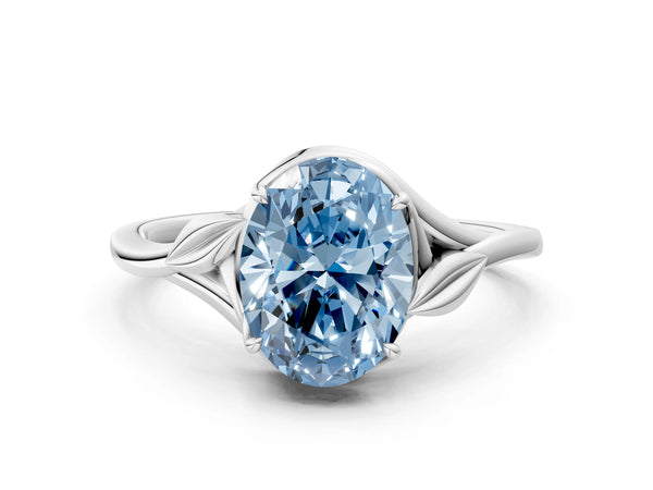 White gold Fancy Blue Oval Cut Diamond Solitaire Ring with Twist Band and Four-Prong Setting
