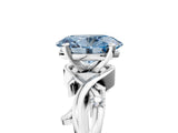 White gold Fancy Blue Oval Cut Diamond Solitaire Ring with Twisted Band and Prong Setting_324