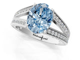 White gold Fancy Blue Oval Cut Diamond Split Shank Ring with Pavé Band and Four-Prong Setting_44