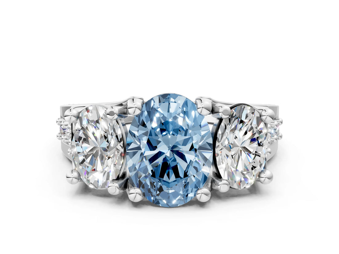 White gold Fancy Blue Oval Cut Diamond Three-Stone Ring with Channel Set Band and Four-Prong Setting_60