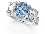 White gold Fancy Blue Oval Cut Diamond Three-Stone Ring with Channel Set Band and Four-Prong Setting_61