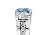 White gold Fancy Blue Oval Cut Diamond Three-Stone Ring with Channel Set Band and Four-Prong Setting_65