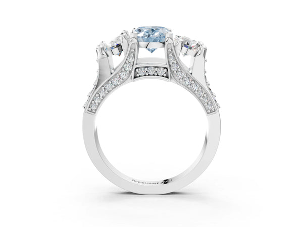 Platinum Fancy Blue Oval Cut Diamond Three-Stone Ring with Channel Set Band and Four-Prong Setting