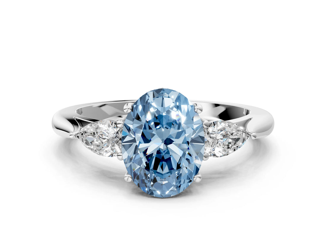 White gold Fancy Blue Oval Cut Diamond Three-Stone Ring with Pear  Side Stones and Prong Setting_172
