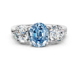 White gold Fancy Blue Oval Cut Diamond Three-Stone Ring with Prong Setting and Classic Band_123