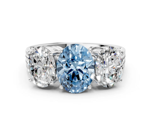 White gold Fancy Blue Oval Cut Diamond Three-Stone Ring with Prong Setting and Textured Band