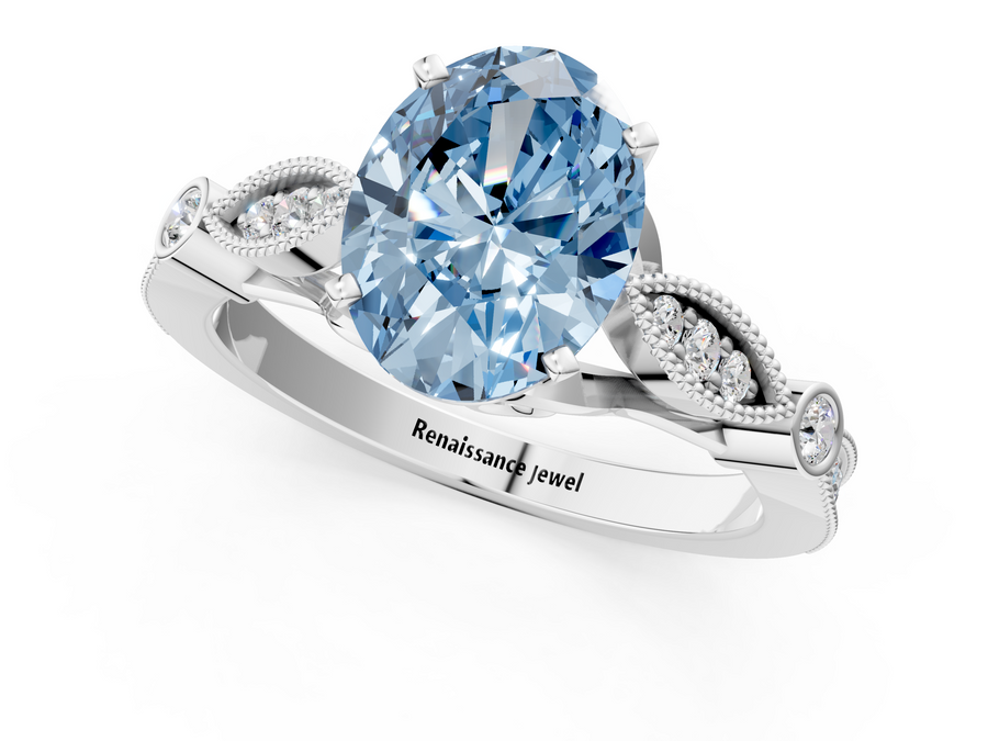 White gold Fancy Blue Oval  Cut Diamond with Milgrain Marquise and Bezel Accents on a Solitaire Band with Prong Setting