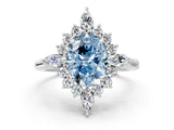 White gold Fancy Blue Oval Cut Halo Diamond Cluster Ring with Marquise and Round Stones on a White Gold Band with Prong Setting