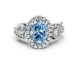 White gold Fancy Blue Oval Cut Halo Diamond Ring with Milgrain and Bezel Accents on a Split Shank Band_12