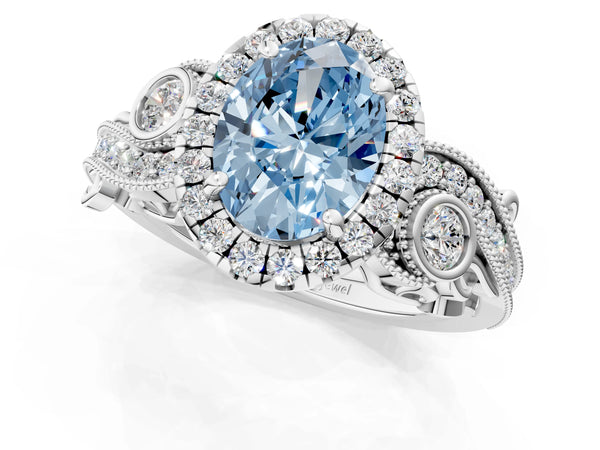 White gold Fancy Blue Oval Cut Halo Diamond Ring with Milgrain and Bezel Accents on a Split Shank Band