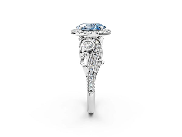 White gold Fancy Blue Oval Cut Halo Diamond Ring with Milgrain and Bezel Accents on a Split Shank Band