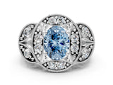 White gold Fancy Blue Oval Cut Halo Milgrain Diamond Engagement Ring with Leaf Band and Four-Prong Setting