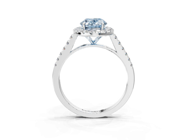 White gold Fancy Blue Oval Cut Halo Pave Diamond Engagement Ring with Four-Prong Setting