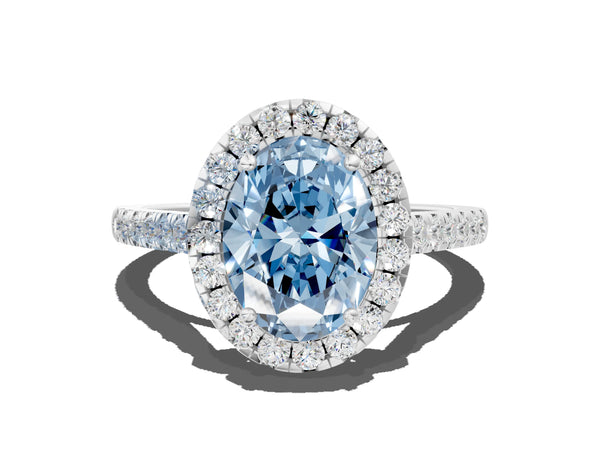 White gold Fancy Blue Oval Cut Halo Pave Diamond Engagement Ring with Four-Prong Setting