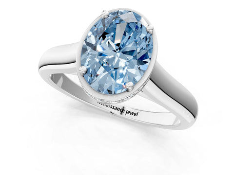 White gold Fancy Blue Oval Cut Solitaire Diamond Engagement Ring with Four-Prong Setting and Tapered Band_25