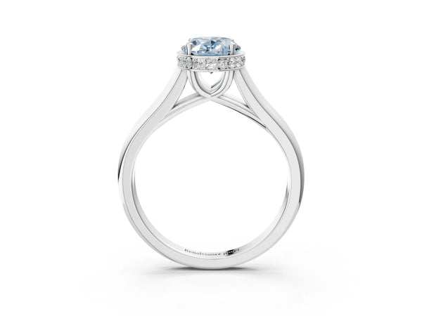 White gold Fancy Blue Oval Cut Solitaire Diamond Engagement Ring with Four-Prong Setting and Tapered Band