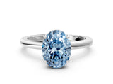 White gold Fancy Blue Oval Cut Solitaire Diamond Ring with Prong Setting and Plain Band