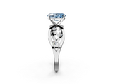White gold Fancy Blue Oval  Cut Solitaire Diamond with Side Stones on Criss-Cross Band and Four-Prong Setting_5