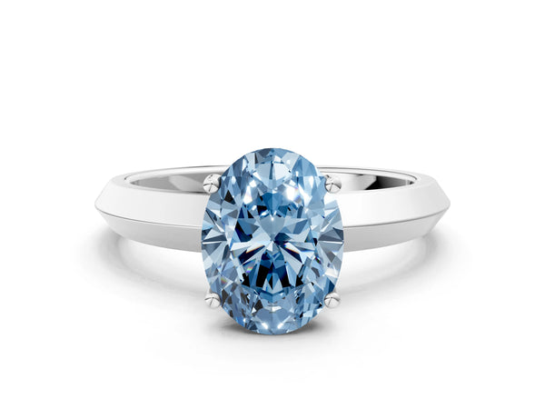 White gold Fancy Blue Oval  Cut Solitaire Engagement Ring with Flat Band and Four-Prong Setting