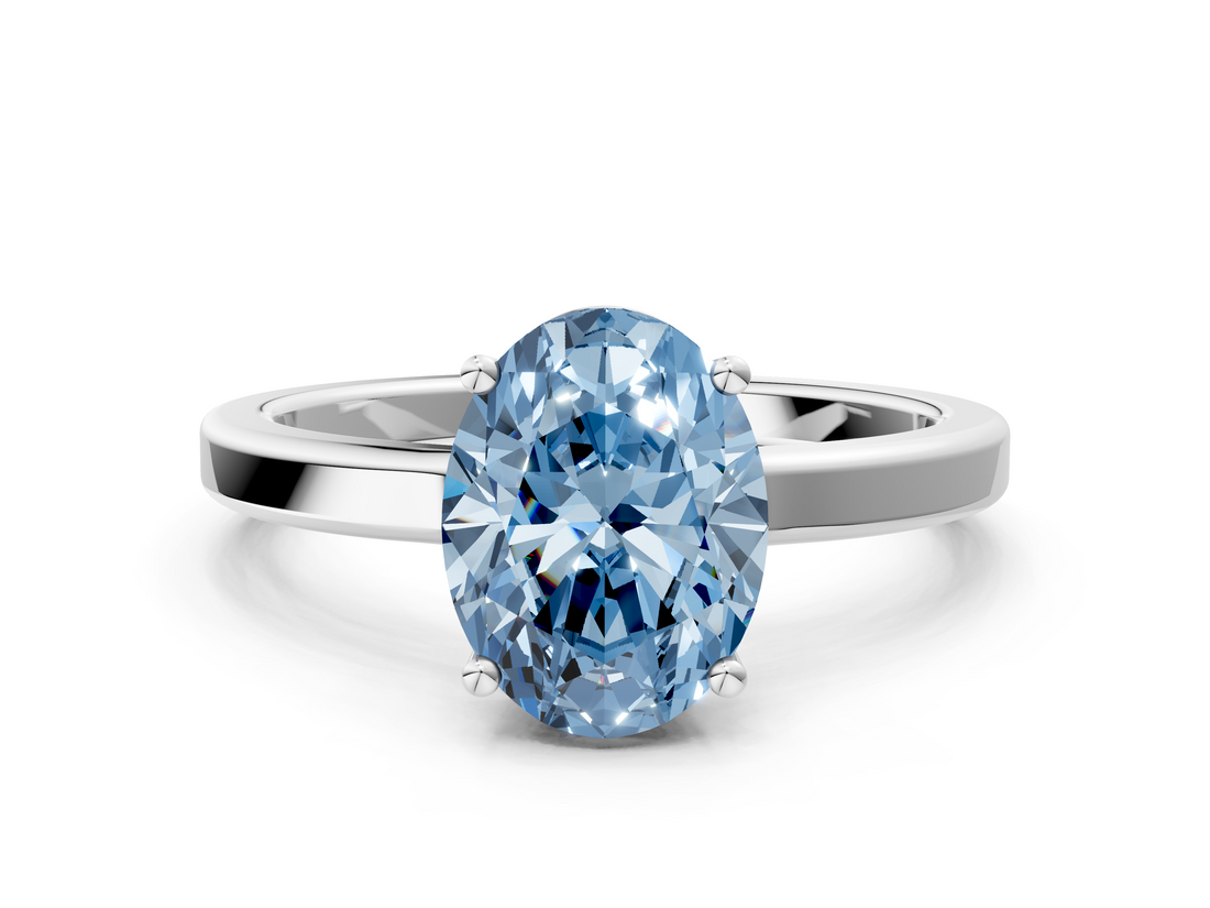 White gold Fancy Blue Oval  Cut Solitaire Engagement Ring with Four-Prong Setting on a Classic Band_20