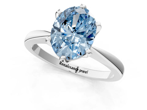 White gold Fancy Blue Oval Cut Solitaire Engagement Ring with Six-Prong Setting and Tapered Band_1