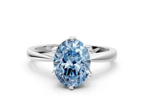 White gold Fancy Blue Oval Cut Solitaire Engagement Ring with Six-Prong Setting and Tapered Band