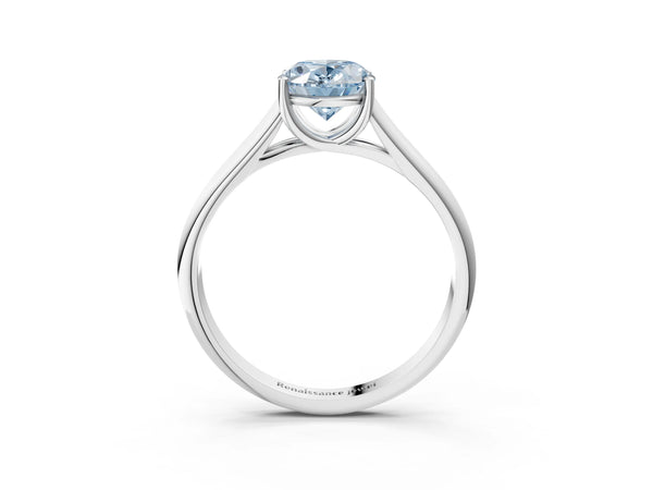 White gold Fancy Blue Oval Cut Solitaire Engagement Ring with Tapered Band and Four-Prong Setting