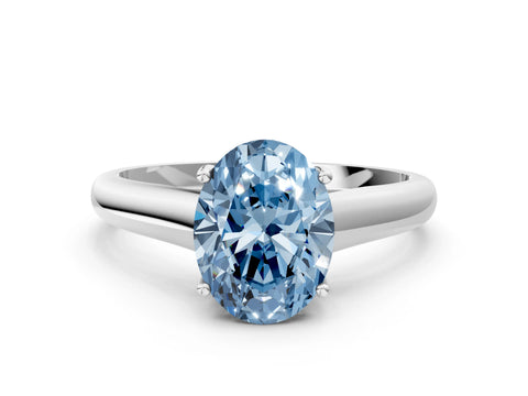 White gold Fancy Blue Oval Cut Solitaire Engagement Ring with Tapered Band and Four-Prong Setting_27