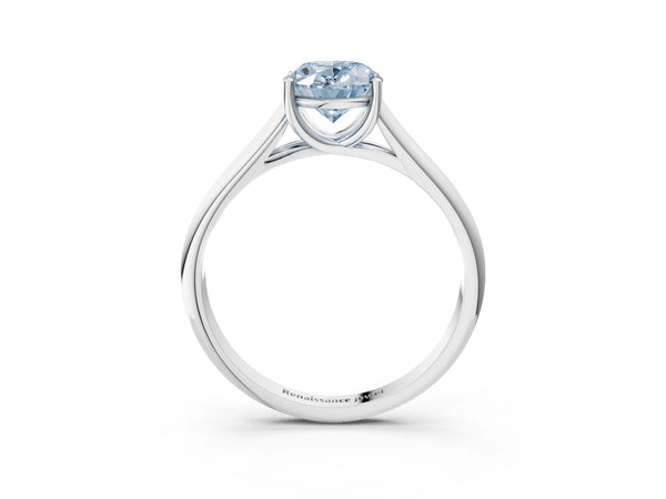 White gold Fancy Blue Oval Cut Solitaire Engagement Ring with Tapered Band and Four-Prong Setting