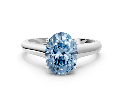 White gold Fancy Blue Oval Cut Solitaire Engagement Ring with Tapered Band and Four-Prong Setting_3
