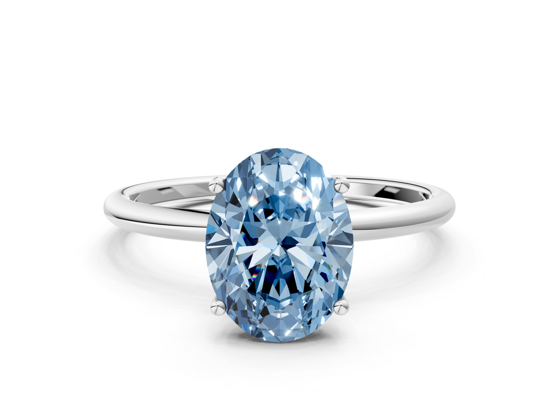 White gold Fancy Blue Oval  Cut Solitaire Engagement Ring with Thin Band and Four-Prong Setting_3