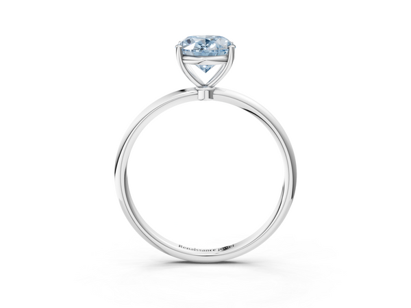 White gold Fancy Blue Oval  Cut Solitaire Engagement Ring with Thin Band and Four-Prong Setting