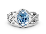 White gold Fancy Blue Oval Cut Solitaire Intertwined Band Prong Setting Ring