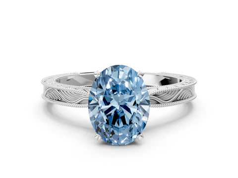 White gold Fancy Blue Oval Cut Solitaire Milgrain Engraved Band with Four-Prong Setting_12