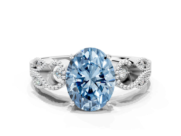Platinum Fancy Blue Oval Cut Solitaire Milgrain Leaf Band with Prong Setting