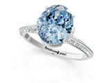 White gold Fancy Blue Oval Cut Solitaire Split Shank Pave Diamond Engagement Ring with Four-Prong Setting_1