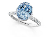 White gold Fancy Blue Oval Cut Solitaire Split Shank Pave Diamond Engagement Ring with Four-Prong Setting_25