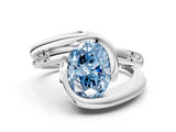 White gold Fancy Blue Oval Cut Solitaire Tension-Set Diamond Split Shank Ring