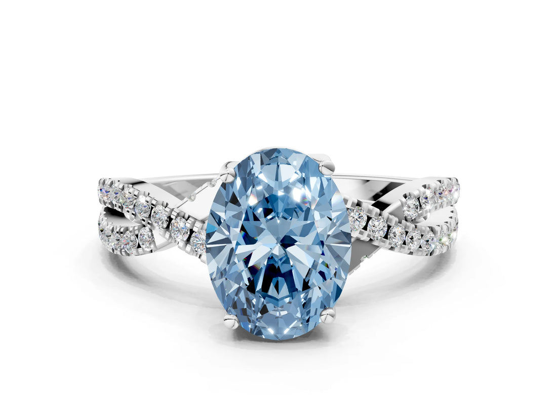 White gold Fancy Blue Oval Cut Solitaire Twist Pave Diamond Engagement Ring with Prong Setting