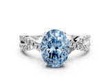White gold Fancy Blue Oval Cut Solitaire Twist Pave Diamond Engagement Ring with Prong Setting