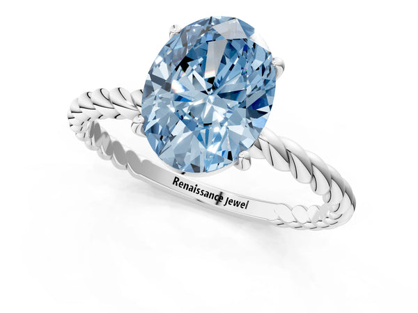 White gold Fancy Blue Oval Cut Solitaire Twisted Band 4-Prong Ring