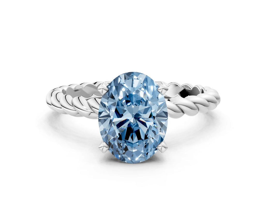 White gold Fancy Blue Oval  Cut Solitaire Twisted Band with Four-Prong Setting_93