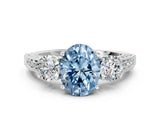 White gold Fancy Blue Oval Cut Three-Stone Diamond Ring with Pavé Band and Four-Prong Setting_12
