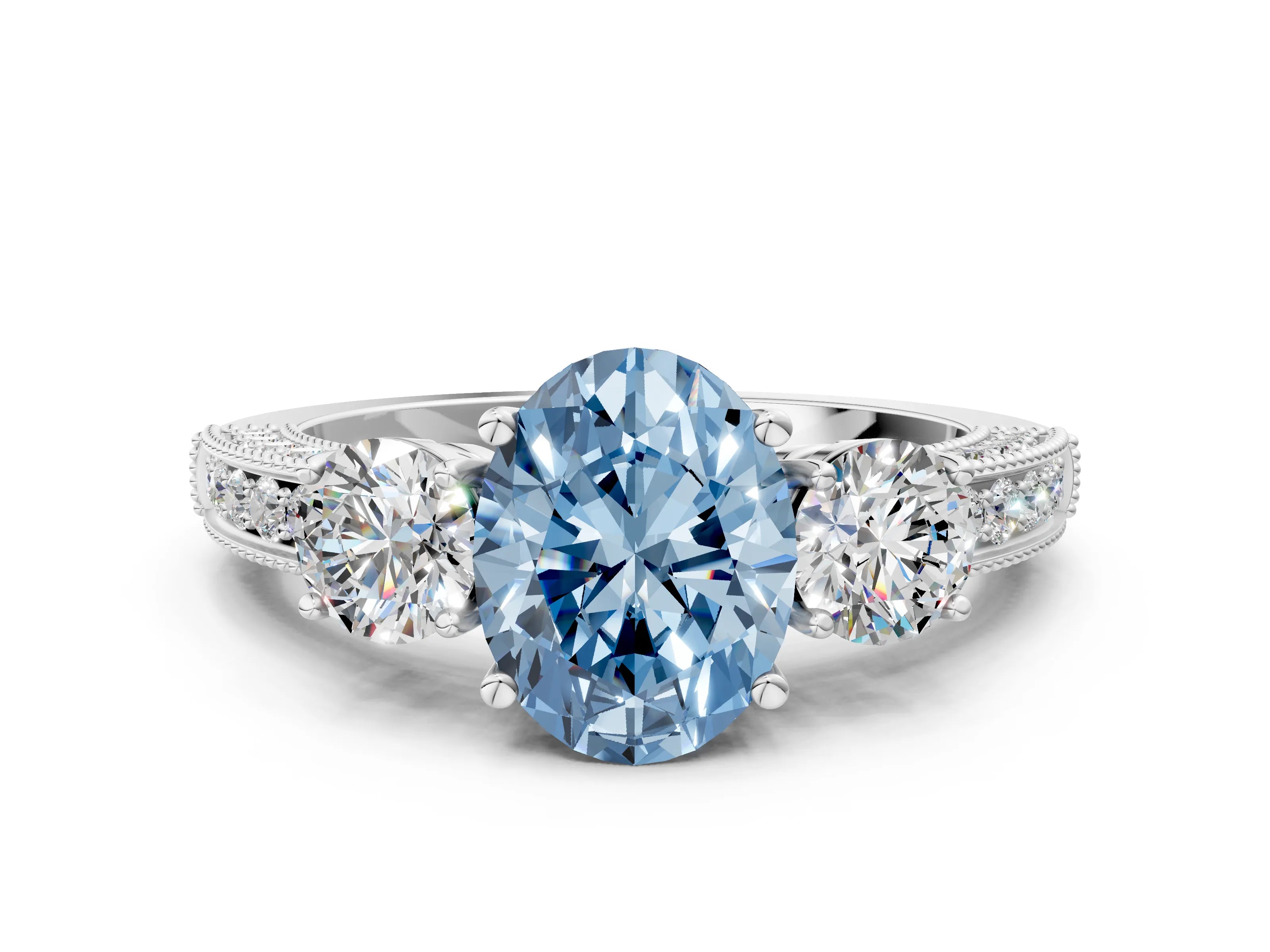 White gold Fancy Blue Oval Cut Three-Stone Diamond Ring with Pavé Band and Four-Prong Setting