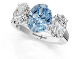 White gold Fancy Blue Oval Cut Three-Stone Diamond Ring with Prong Setting on a Classic Band_1