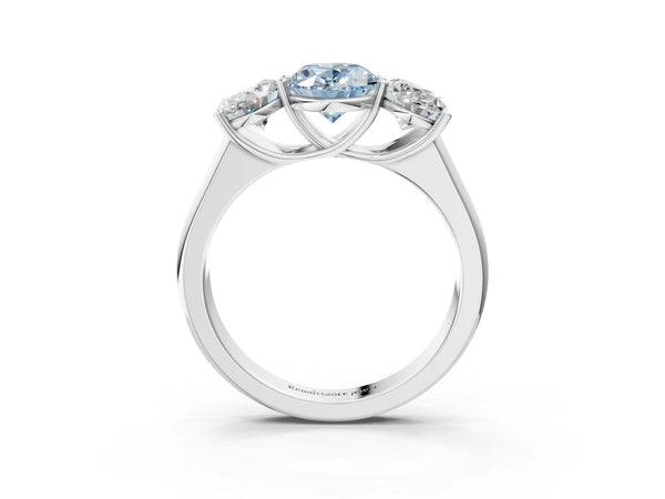 White gold Fancy Blue Oval Cut Three-Stone Diamond Ring with Prong Setting on a Classic Band
