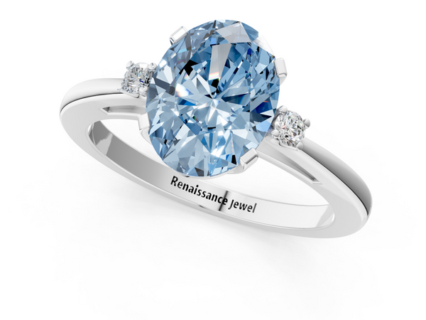 White gold Fancy Blue Oval  Cut Three-Stone Solitaire Ring with Round Accent Diamonds and Four-Prong Setting