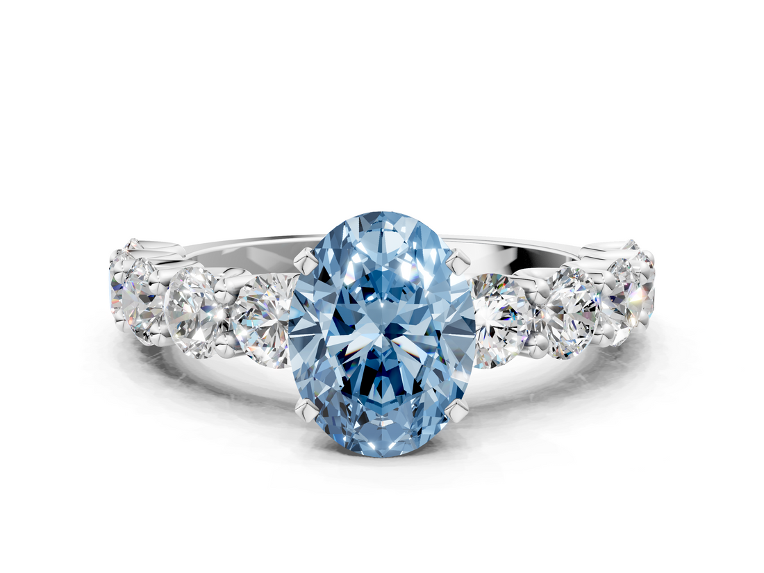 White gold Fancy Blue Oval  Diamond Prong Setting with Side Stones on a Pave Band_135