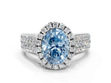 White gold Fancy Blue Oval  Halo Round Diamond Pave Band with Prong Setting
